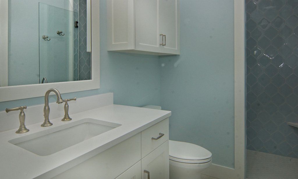 Guest bathroom, light blue, gray and white