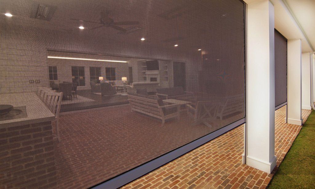 Large outdoor patio with electric operated insect screens